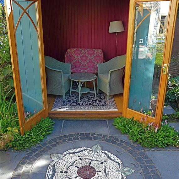 Kate Atkinson's writing den and mosaic, designed by Carolyn Grohmann