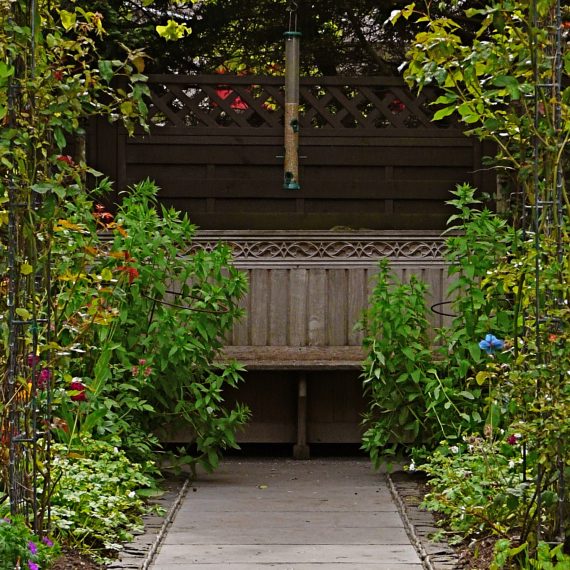 Oak pew, Kate Atkinson's garden, designed by Carolyn Grohmann