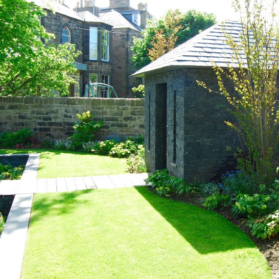 Slate and stone garden building, designed by Carolyn Grohmann