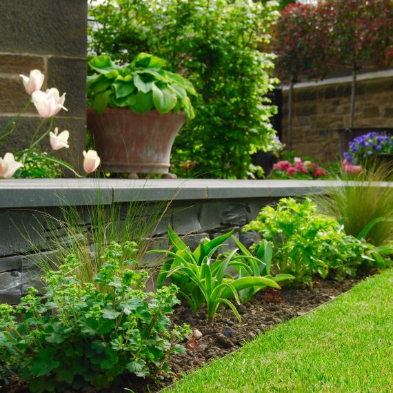 Black basalt copes, drystone effect walling designed by Carolyn Grohmann