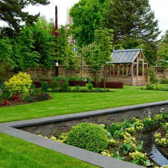 Sunken garden, rill water feature, Gabriel Ash greenhouse, garden designed by Carolyn Grohmann
