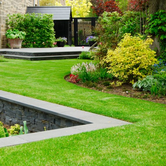 Sunken garden, lawns, and planted borders, designed by Carolyn Grohmann