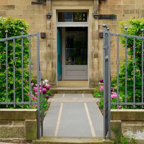 Black basalt paving with Clashach inlay and cut stone mosaic by Joel Baker. Garden designed by Carolyn Grohmann