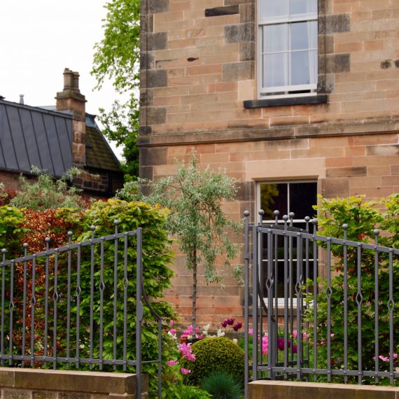 Sweeping railing and gate by Ratho Byres Forge
