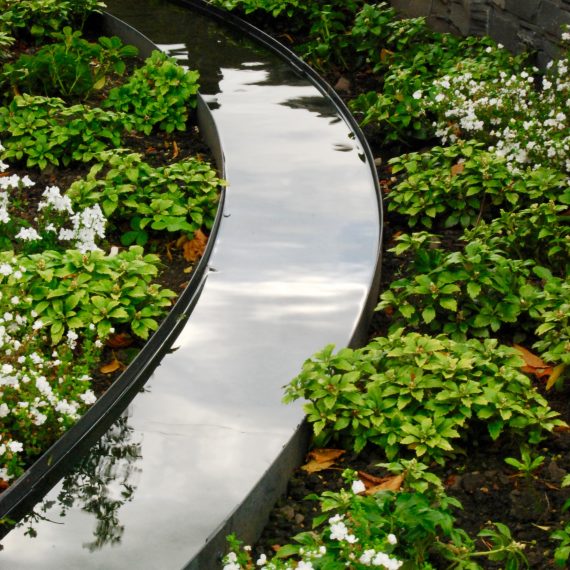 Metal rill water feature designed by Carolyn Grohmann