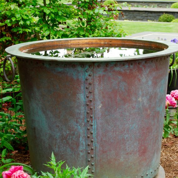 Copper tub water feature made by Ratho Byres Forge, designed by Carolyn Grohmann
