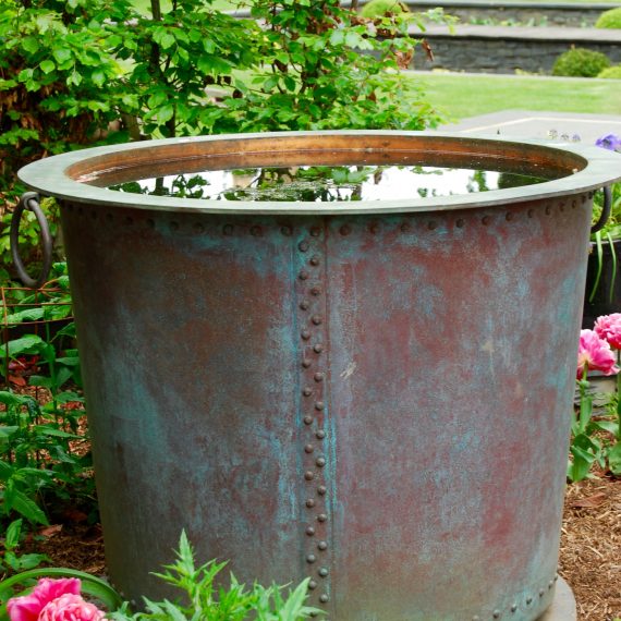 Copper tub water feature made by Ratho Byres Forge, designed by Carolyn Grohmann