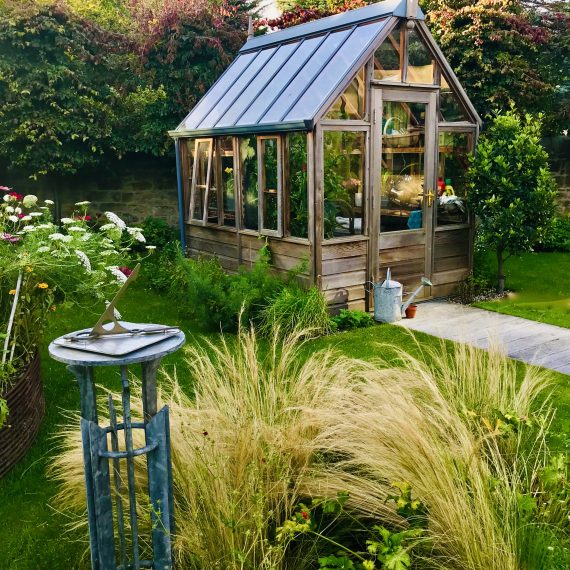 Gabriel Ash Greenhouse with Macmillan Hunter sundial