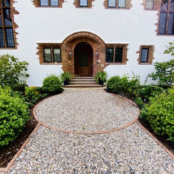 Arts and Crafts house with planted borders