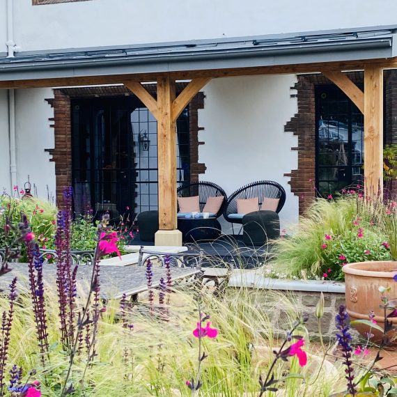 Scottish larch veranda with Millboard decking