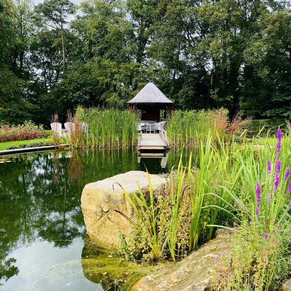 Swimming pond with boulders