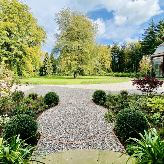 Driveway roundel and front door planting