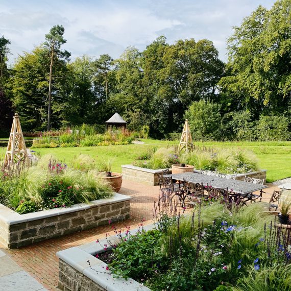 Family patio framed by raised beds