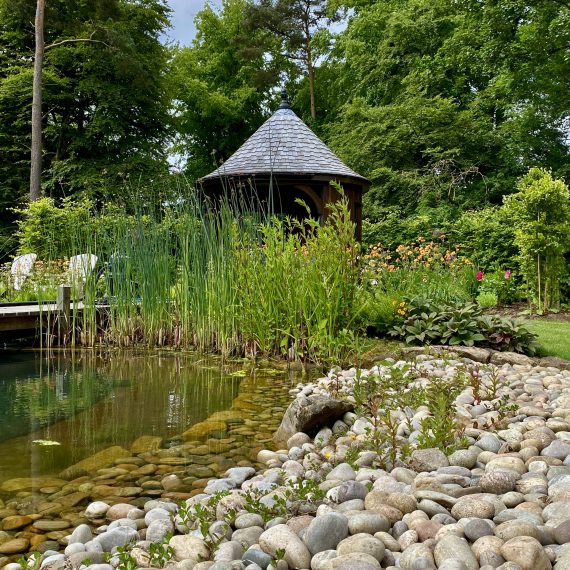 Swimming pond pebble beach