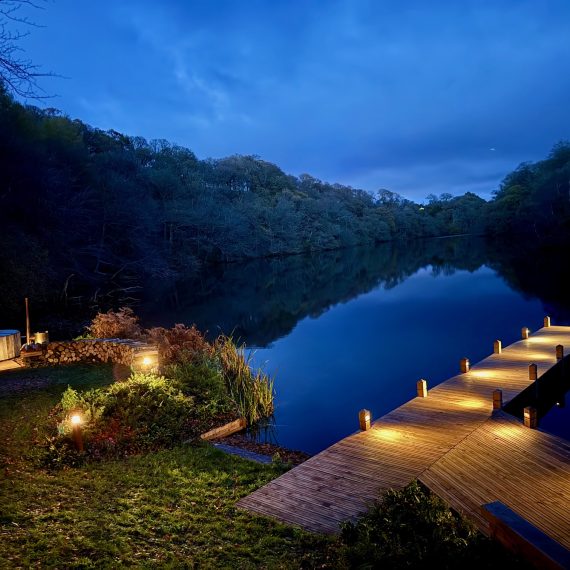 Jetty and firepit circle at night