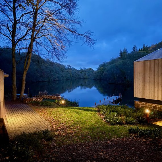 Boathouse and lake at dusk