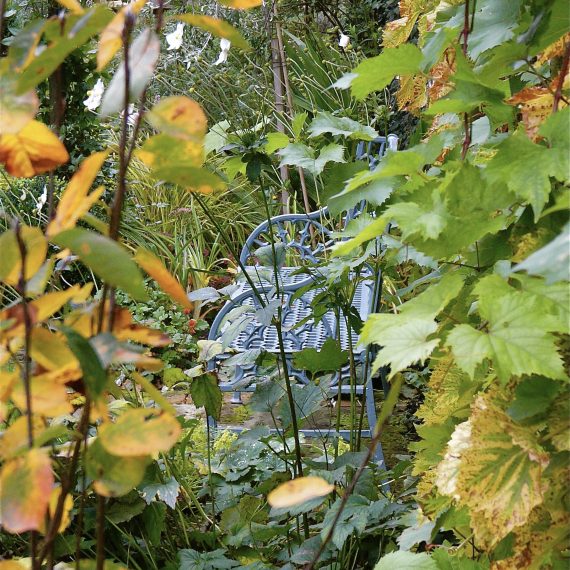 Metal garden bench painted blue