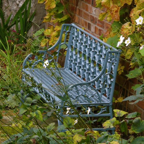 Metal garden bench painted blue