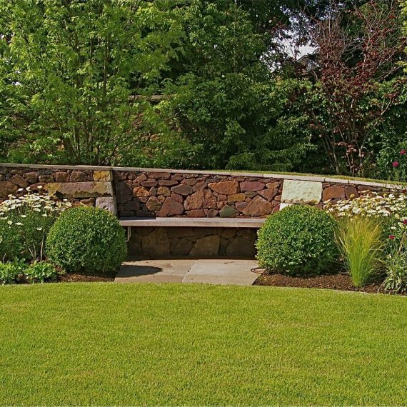 Oak bench built into Serpentine wall, designed by Carolyn Grohmann