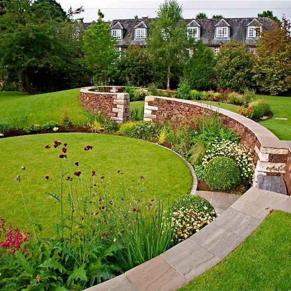 Serpentine wall with circular lawns, designed by Carolyn Grohmann