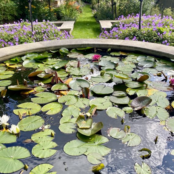 Stone water feature in Victorian garden