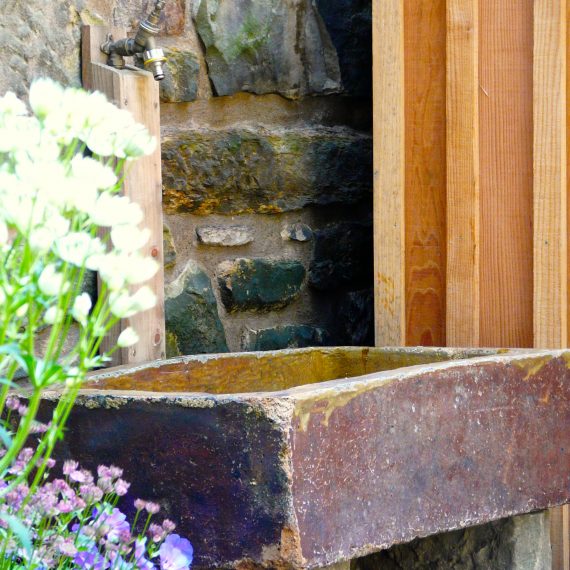 Stone sink, Eton Terrace Garden designed by Carolyn Grohmann