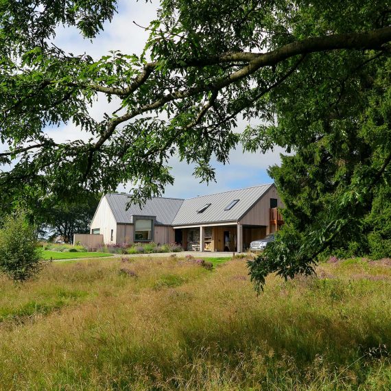 House sitting comfortably in its rural setting