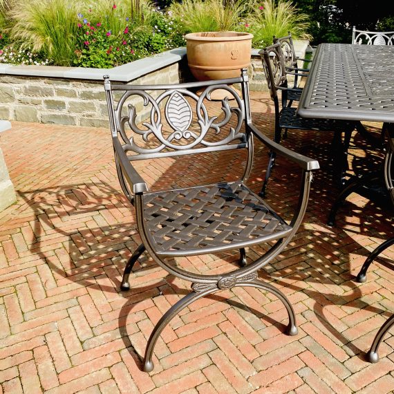 Oxleys Artemis chair looking the part in this Arts and Crafts garden