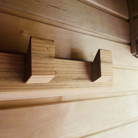 Hooks for towels and sauna panelling